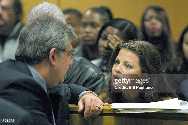 Actress Yasmine Bleeth speaks with her attorney Jerome Sabbota in Wayne County Cicruit Court January 9, 2002 in Detroit, MI. The former "Baywatch"...