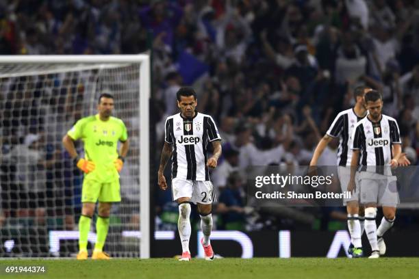 Dani Alves of Juventus looks dejected during the UEFA Champions League Final between Juventus and Real Madrid at National Stadium of Wales on June 3,...