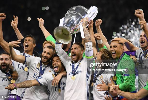 Sergio Ramos of Real Madrid lifts The Champions League trophy after the UEFA Champions League Final between Juventus and Real Madrid at National...