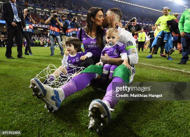 Pilar Rubio and Sergio Ramos of Real Madrid kiss after the UEFA Champions League Final between Juventus and Real Madrid at National Stadium of Wales...