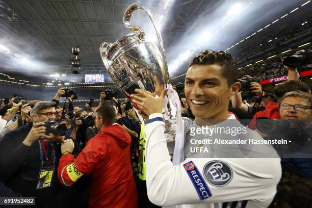 Cristiano Ronaldo of Real Madrid celebrates with The Champions League trophy after the UEFA Champions League Final between Juventus and Real Madrid...