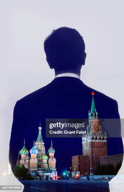 man looking out to square. - russische kultur stock-fotos und bilder