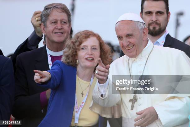 Pope Francis, flanked by Evangelical leader Michelle Moran, attends The Golden Jubilee of the Catholic Charismatic Reneval at the Circo Massimo on...
