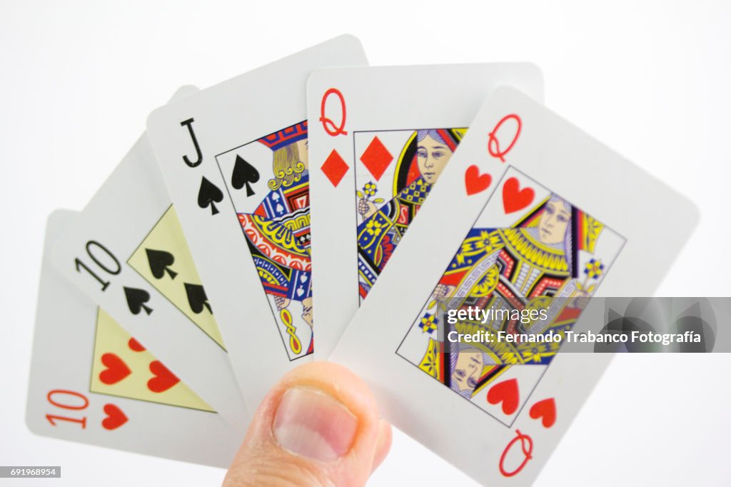 Close-Up Of Gambling Cards On Table