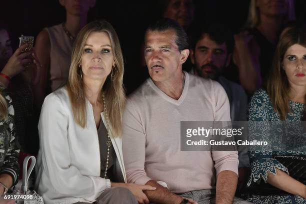 Nicole Kimpel and Antonio Banderas are seen front row at the Fisico Show during Miami Fashion Week at Ice Palace Film Studios on June 3, 2017 in...