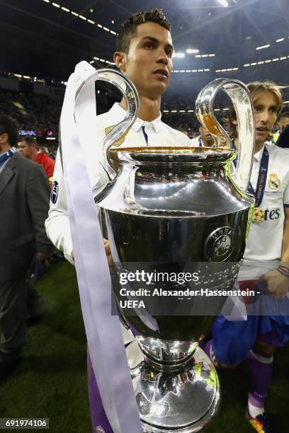 Cristiano Ronaldo of Real Madrid celebrates with The Champions League trophy after the UEFA Champions League Final between Juventus and Real Madrid...