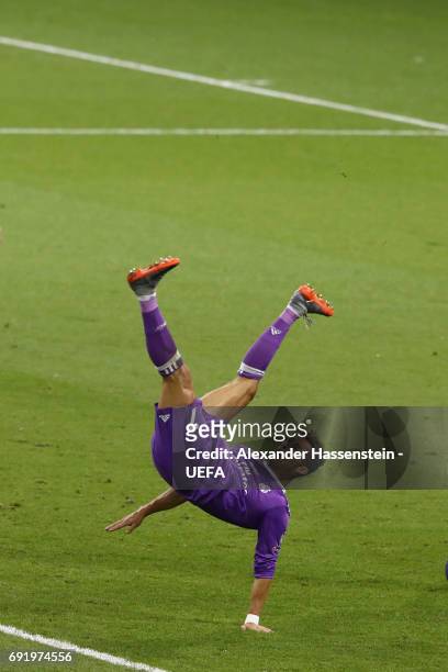 Cristiano Ronaldo of Real Madrid attempts an overhead kick during the UEFA Champions League Final between Juventus and Real Madrid at National...