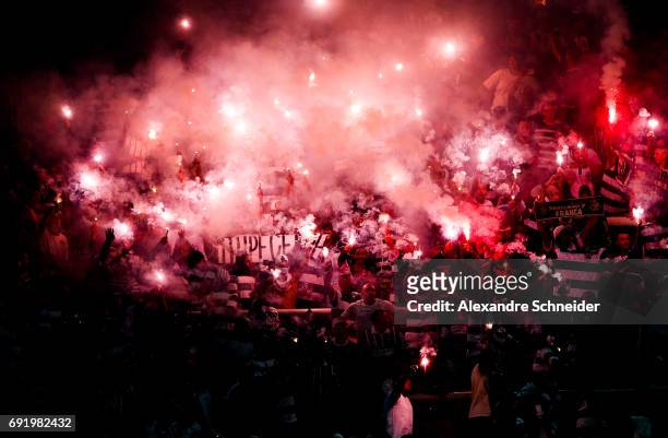 Fans of Corinthians cheer during the match between Corinthians and Santos for the Brasileirao Series A 2017 at Arena Corinthians stadium on June 03,...