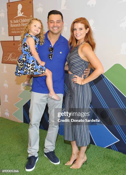 Nick Swisher and JoAnna Garcia Swisher at the Brooks Brothers Beverly Hills summer camp party benefitting St. Jude Children's Research Hospital at...
