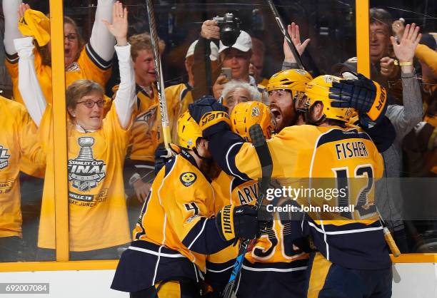 James Neal of the Nashville Predators celebrates his goal with Ryan Ellis, Viktor Arvidsson and Mike Fisher against the Pittsburgh Penguins during...