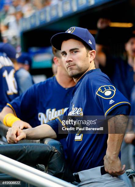 Nick Franklin of the Milwaukee Brewers looks over in the dugout in an MLB baseball game against the New York Mets on May 31, 2017 at CitiField in the...