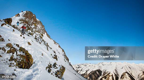 backcountry skiers in silverton, co. - silverton colorado skiing stock pictures, royalty-free photos & images