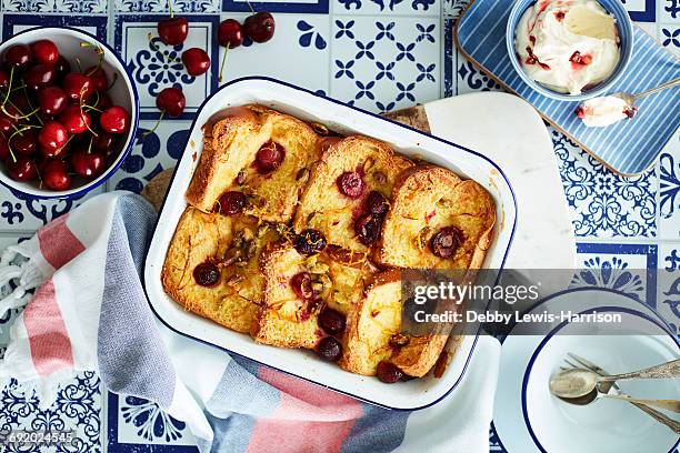 cherry bread and butter pudding - bread dessert stock pictures, royalty-free photos & images