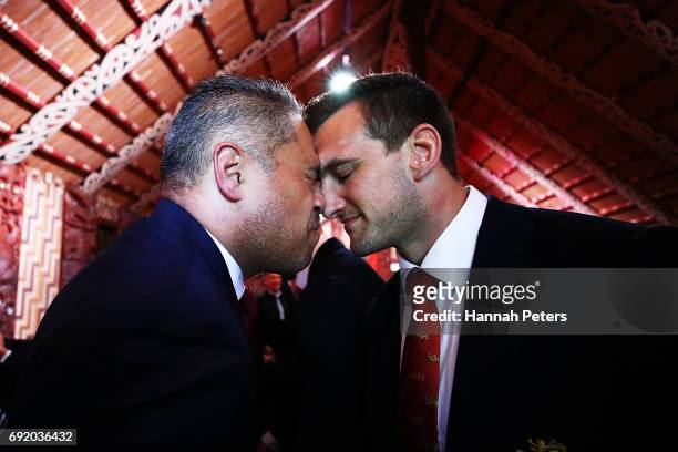 Sam Warburton of the Lions receives a hongi after being welcomed in the main meeting house during the British & Irish Lions Maori Welcome at Waitangi...