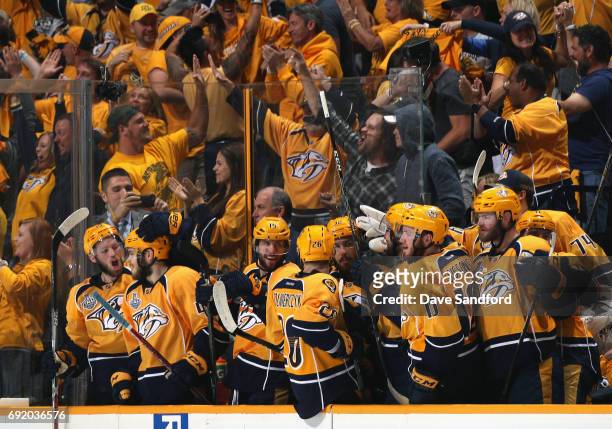 The Nashville Predators bench and the crowd celebrates after James Neal scored in the second period of Game Three of the 2017 NHL Stanley Cup Final...