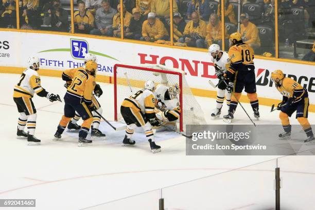 Nashville Predators right wing James Neal watches as Pittsburgh Penguins goalie Matt Murray looks for the puck during the second period of Game 3 of...