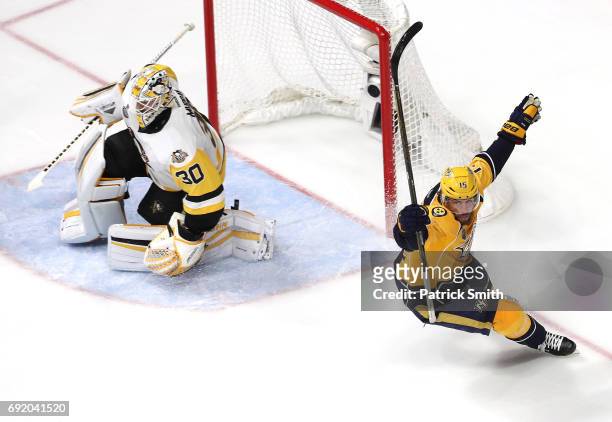 Craig Smith of the Nashville Predators celebrates after scoring a third period goal against Matt Murray of the Pittsburgh Penguins in Game Three of...