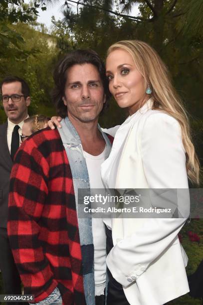 Designer Greg Lauren and Actor Elizabeth Berkley at the 16th Annual Chrysalis Butterfly Ball on June 3, 2017 in Los Angeles, California.