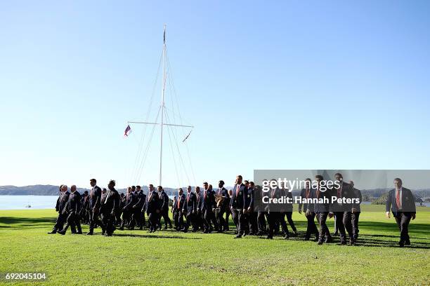 The Lions team walk up to the meeting house during the British & Irish Lions Maori Welcome at Waitangi Treaty Grounds on June 4, 2017 in Waitangi,...