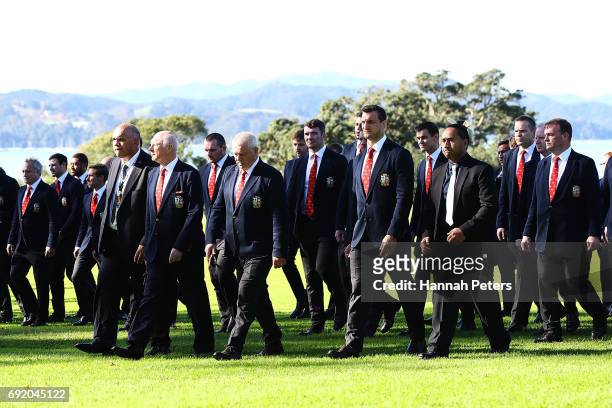 Lions team manager John Spencer, head coach Warren Gatland of the Lions and Sam Warburton of the Lions lead the team to the meeting house during the...