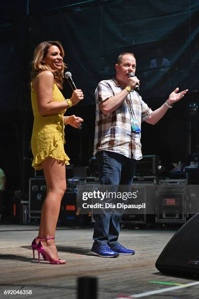 Radio personalities Carolina Bermudez Paul Cubby Bryant speak onstage during 103.5 KTU's KTUphoria 2017 presented by AT&T at Northwell Health at...