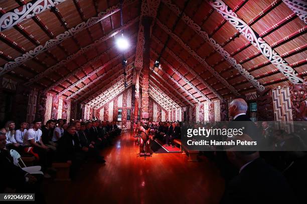 Team manager John Spencer speaks in the meeting house during the British & Irish Lions Maori Welcome at Waitangi Treaty Grounds on June 4, 2017 in...