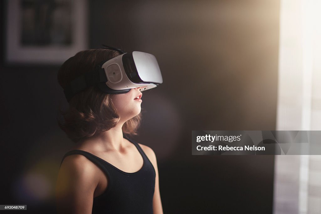 Girl using VR headset