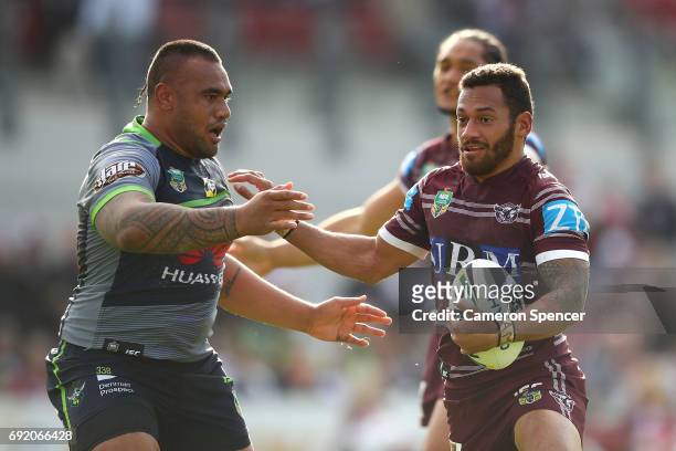Apisai Koroisau of the Sea Eagles runs the ball during the round 13 NRL match between the Manly Sea Eagles and the Canberra Raiders at Lottoland on...