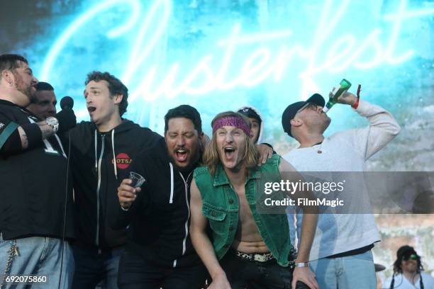 Comedians Big Jay Oakerson, Dan Soder and Pete Davidson perform onstage at the Piazza Del Cluster Stage during Colossal Clusterfest at Civic Center...