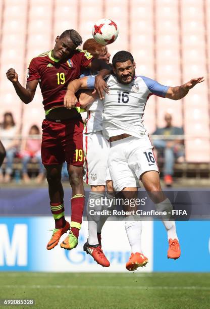 Sergio Cordova of Venezuela, Justen Glad and Cameron Carter-Vickers of the USA compete for the ball during the FIFA U-20 World Cup Korea Republic...