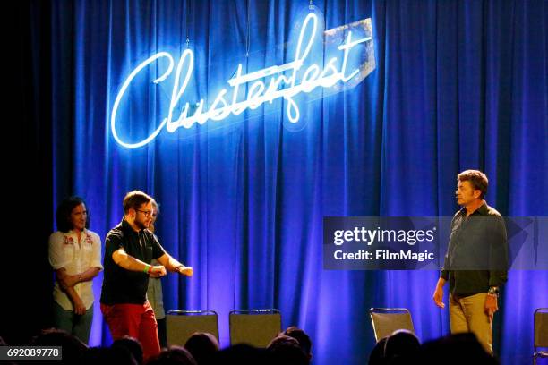 Comedian Cole Stratton and actor John Michael Higgins perform onstage at the Larkin Comedy Club during Colossal Clusterfest at Civic Center Plaza and...