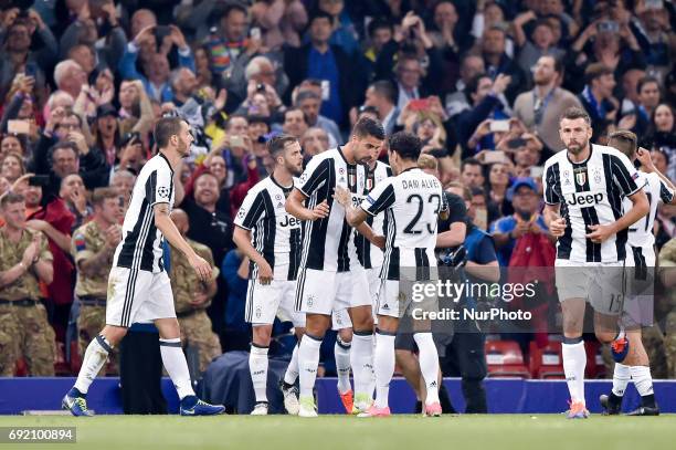 Mario Mandzukic of Juventus celebrates scoring first goal during the UEFA Champions League Final match between Real Madrid and Juventus at the...