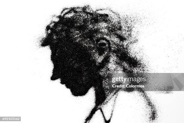 side view of man looking down - conceitos e tópicos imagens e fotografias de stock