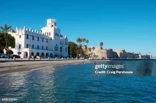 police station in large white building and castle of the knights by kerme gulf. - kos stock-fotos und bilder