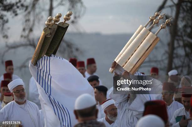 Members of the Samaritan sect take part in a traditional pilgrimage marking the holiday of Shavuot, atop Mount Gerizim near the West Bank city of...