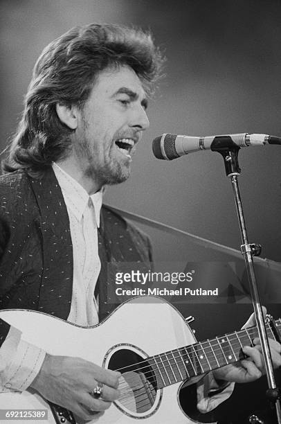 Former Beatle George Harrison performing at the Prince's Trust Concert, Wembley Arena, London, 6th June 1987.