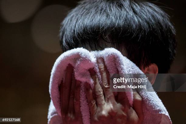 Gaoyuan Lin of China during break at Men's Singles eight-final of Table Tennis World Championship at Messe Duesseldorf on June 4, 2017 in Dusseldorf,...