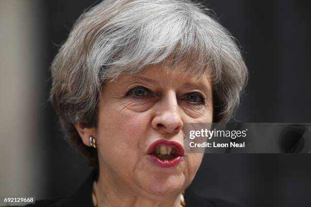 Britain's Prime Minister Theresa May addresses the media as she makes a statement, following a COBRA meeting in response to last night's London...