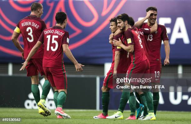 Diego Goncalves of Portugal celebrates with team mates after scoring his teams second goal during the FIFA U-20 World Cup Korea Republic 2017 Quarter...