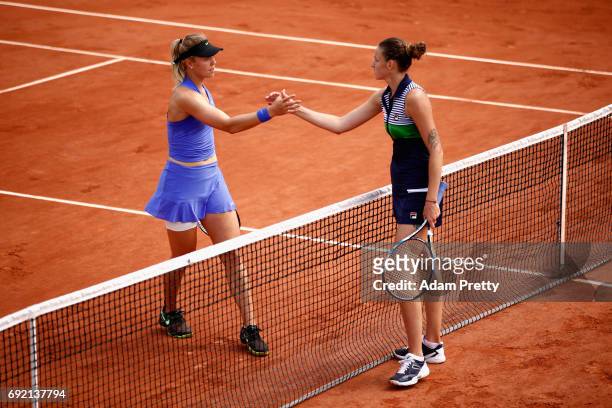 Carina Witthoeft of Germany and winner, Karolina Pliskova of The Czech Republic shake hands following the ladies singles third round match on day...