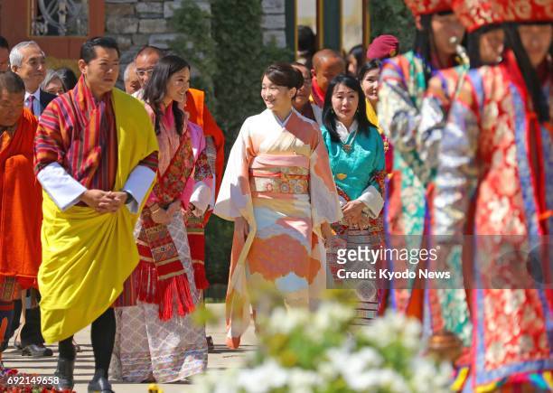 Japan's Princess Mako, the first grandchild of Emperor Akihito and Empress Michiko, visits a flower exhibition in the Bhutan capital Thimphu on June...