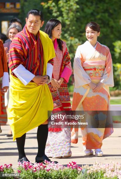Japan's Princess Mako, the first grandchild of Emperor Akihito and Empress Michiko, visits a flower exhibition in the Bhutan capital Thimphu on June...