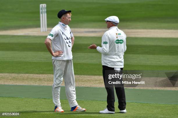 Luke Wells of Sussex remonstrates with umpire Neil Mallender after an lbw decision against batsman Brett D'Oliveira of Worcestershire was revoked...