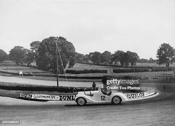 Hector Dobbs of Great Britain drives the Frazer-Nash BMW 328 around Melbourne Corner ahead of Tommy Wisdom driving the Singer 9 Le Mans Replica...