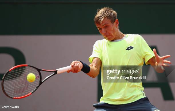 Matteo Martineau of France plays a forehand during the boys singles first round match against Juan Pablo Grassi Mazzuchi of Argentina on day eight of...