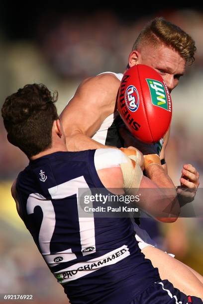 Lachie Neale of the Dockers tackles Adam Treloar of the Magpies during the round 11 AFL match between the Fremantle Dockers and the Collingwood...