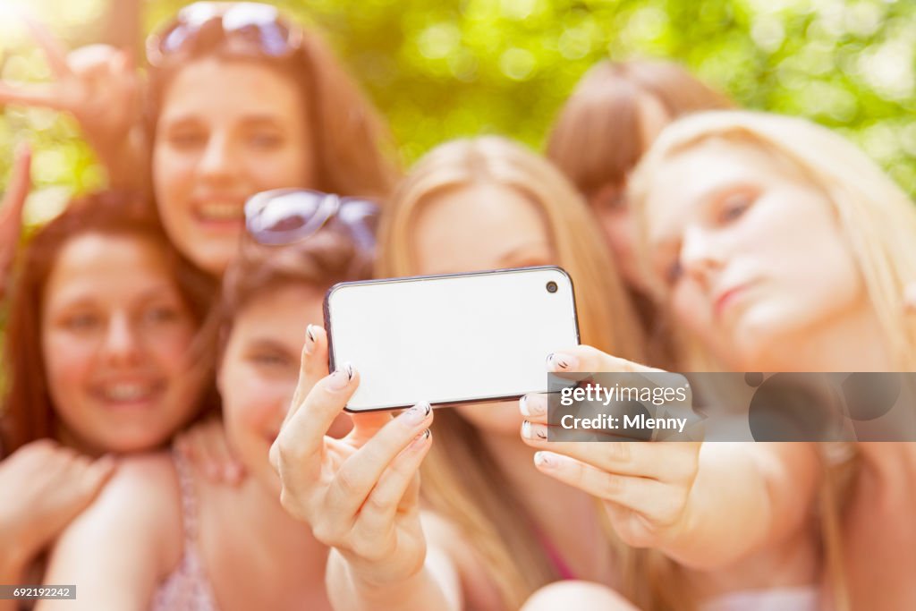 Young Girls Taking Group Selfies In Summer Vacation High Res Stock 