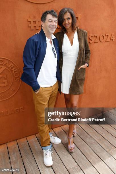 Hosts Stephane Plaza and Karine Le Marchand attend the 2017 French Tennis Open - Day Height at Roland Garros on June 4, 2017 in Paris, France.