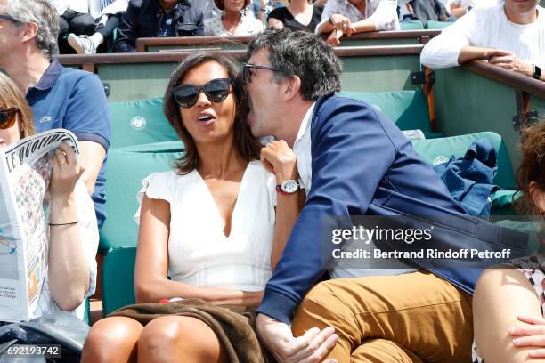 Hosts Karine Le Marchand and Stephane Plaza attend the 2017 French Tennis Open - Day Height at Roland Garros on June 4, 2017 in Paris, France.