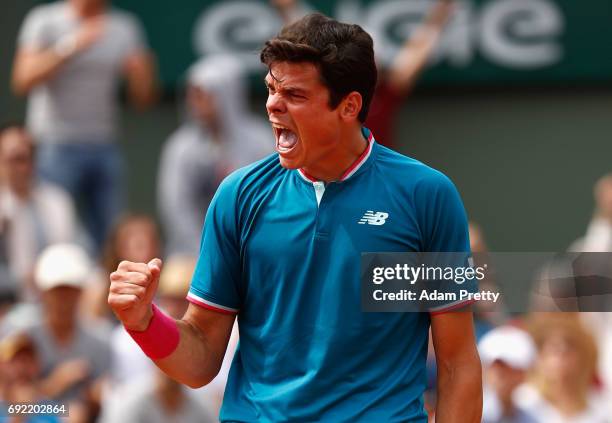 Milos Raonic of Canada celebrates during the mens singles fourth round match against Pablo Carreno Busta of Spain on day eight of the 2017 French...